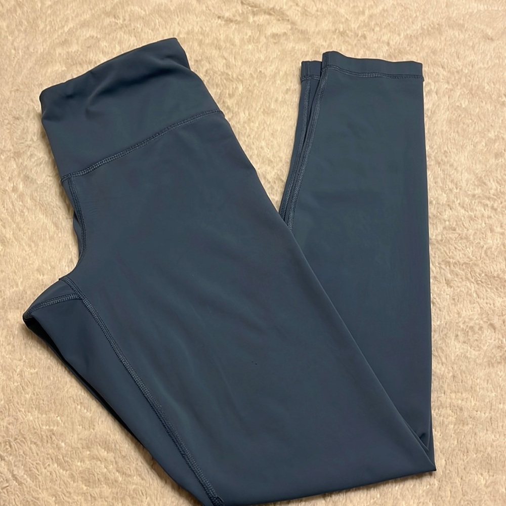 Blue Leggings. Size Medium. Excellent condition. (Not sure if ever even worn)